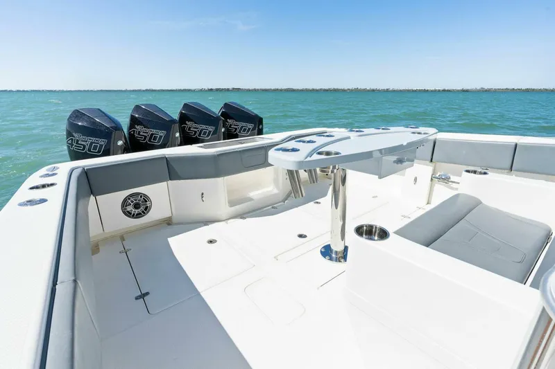 Yacht Photos Pics 2021 SeaVee 390Z boat with quad outboard engines on open water.