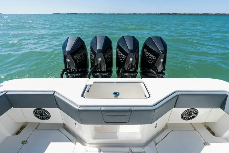  Yacht Photos Pics 2021 SeaVee 390Z boat with quad outboard engines on open water.