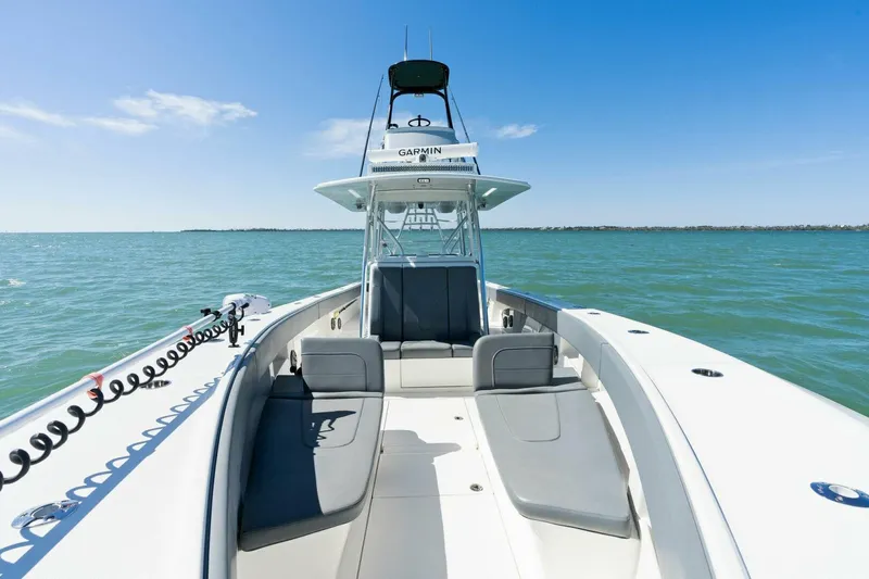  Yacht Photos Pics 2021 SeaVee 390Z boat on open water with seating and navigation equipment.