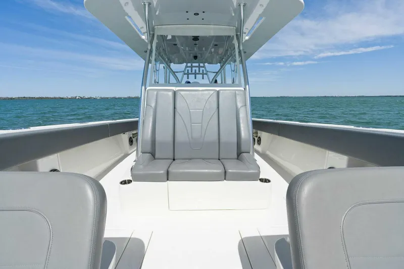  Yacht Photos Pics 2021 SeaVee 390Z boat interior with gray seating on open water.