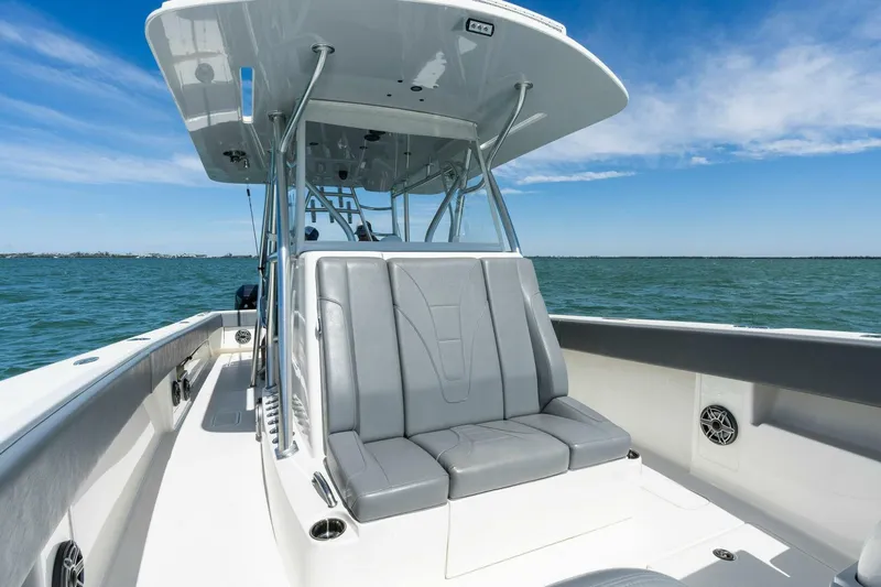  Yacht Photos Pics 2021 SeaVee 390Z boat with gray seating on open water.