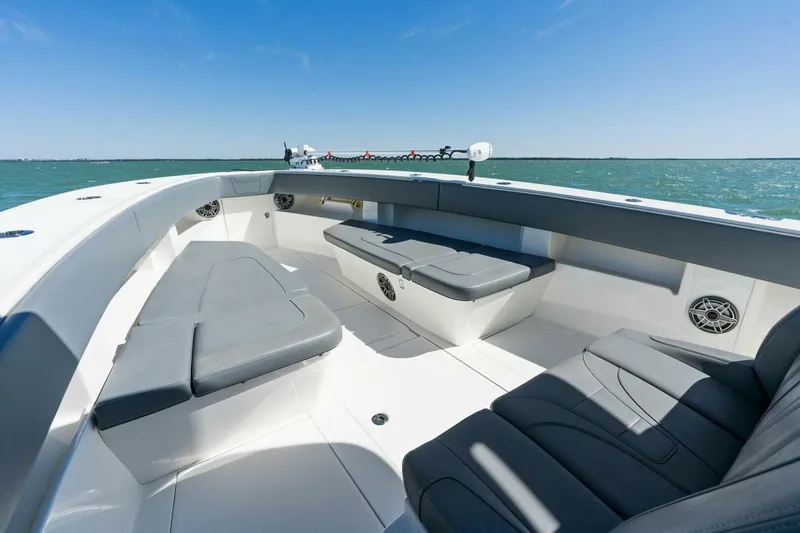  Yacht Photos Pics 2021 SeaVee 390Z boat interior with cushioned seating and ocean view.
