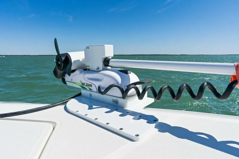  Yacht Photos Pics 2021 SeaVee 390Z boat with a trolling motor on a sunny day.