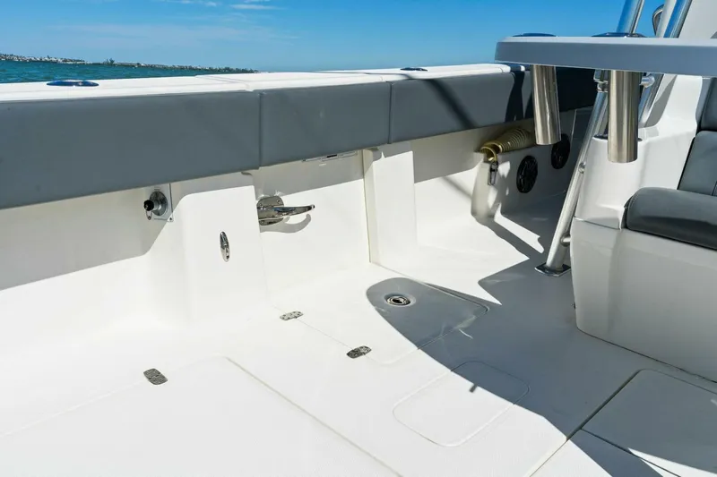  Yacht Photos Pics 2021 SeaVee 390Z boat deck with seating and storage compartments.