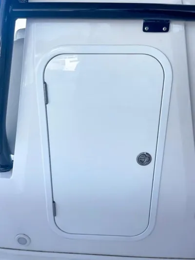  Yacht Photos Pics 2024 Sea Cat 262 HC boat storage compartment door.