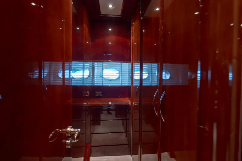 Cool Running Yacht Photos Pics Luxurious wooden interior of 2003 Mochi Craft 22.5 Axis yacht cabin.