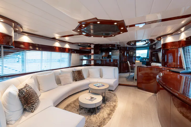 Cool Running Yacht Photos Pics Luxurious interior of 2003 Mochi Craft 22.5 Axis yacht with elegant seating and modern design.