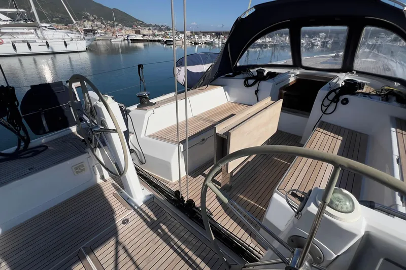  Yacht Photos Pics Grand Soleil 50 sailboat cockpit, 2012 model, featuring dual steering wheels and teak decking.