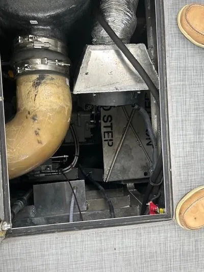 Penelope Yacht Photos Pics Engine compartment of 2023 Smoky Mountain asymmetrical foil-assisted catamaran, showing mechanical components.