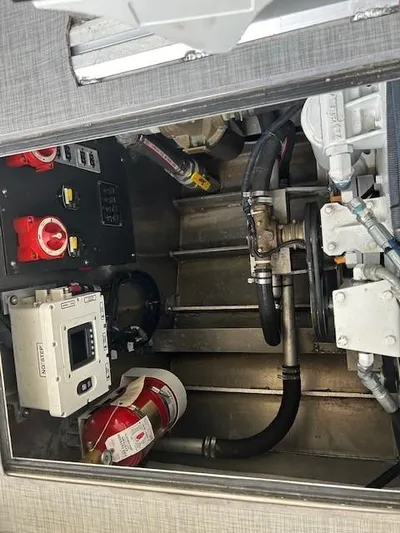 Penelope Yacht Photos Pics Engine compartment of 2023 Smoky Mountain Asymmetrical foil assisted catamaran, showing mechanical components.