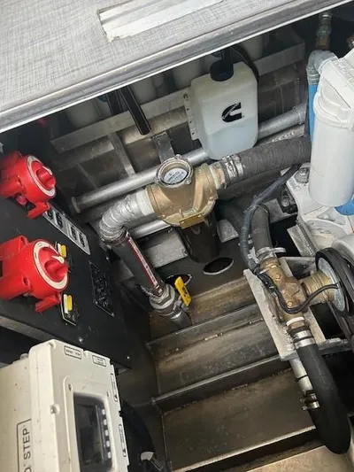 Penelope Yacht Photos Pics Engine compartment of 2023 Smoky Mountain asymmetrical foil-assisted catamaran, showing mechanical components.