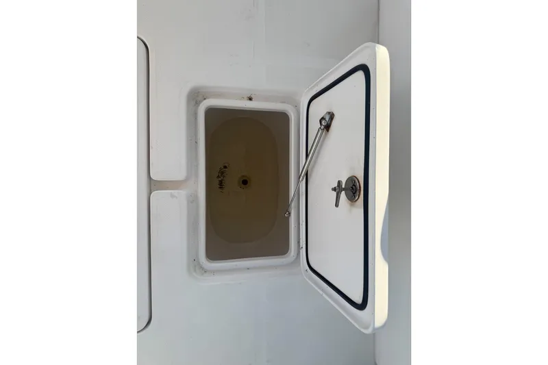  Yacht Photos Pics Open storage compartment on 2024 Invincible 39 Open Fisherman boat.