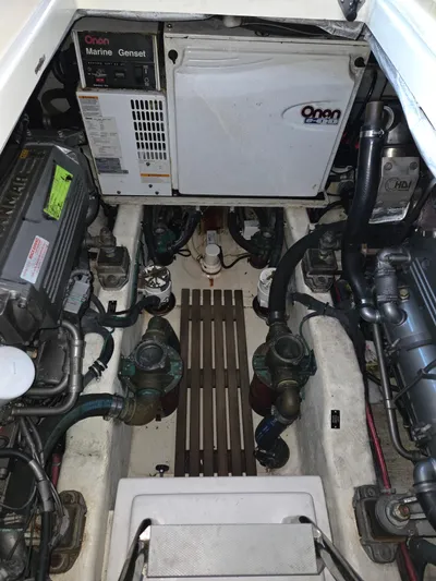 Escapade Yacht Photos Pics Engine compartment of a 2007 Sabre 34 Hardtop Express boat, featuring Onan Marine Genset.