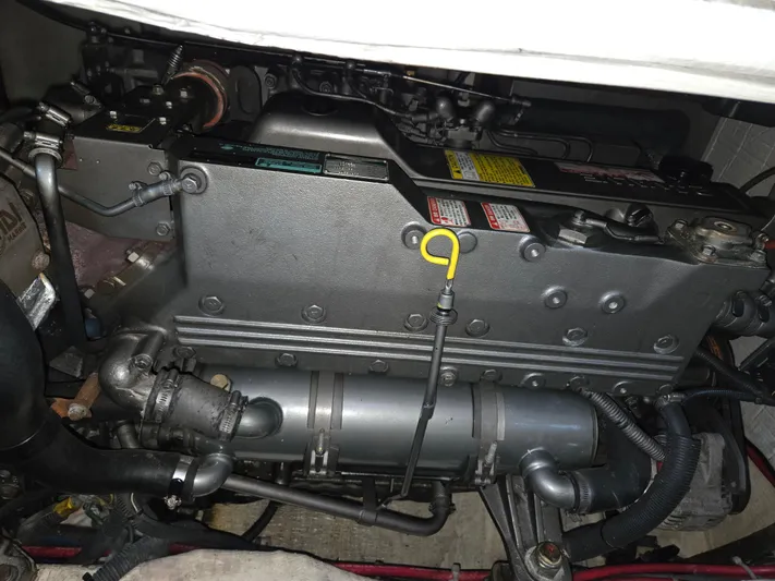 Escapade Yacht Photos Pics Engine compartment of a 2007 Sabre 34 Hardtop Express boat, showcasing mechanical components.