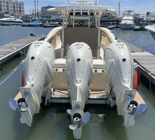 Shady Lady 2 Yacht Photos Pics 2019 Scout 380LXF boat with three outboard engines at the dock.
