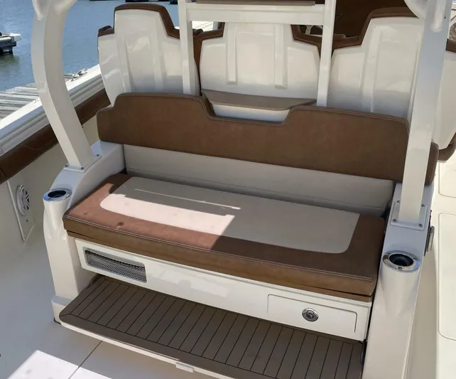 Shady Lady 2 Yacht Photos Pics Scout 380LXF 2019 boat seat with brown upholstery.
