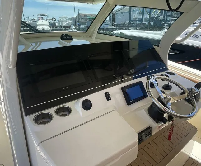 Shady Lady 2 Yacht Photos Pics Interior view of 2019 Scout 380LXF boat cockpit.
