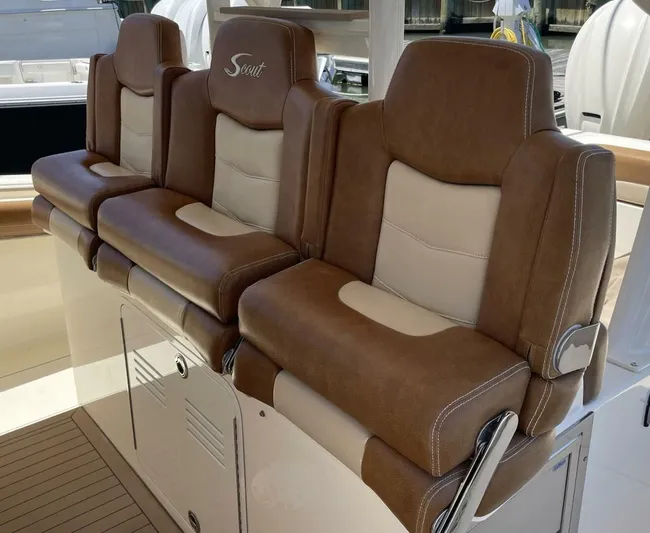 Shady Lady 2 Yacht Photos Pics Brown leather seats on a 2019 Scout 380LXF boat.
