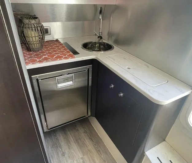 Shady Lady 2 Yacht Photos Pics Scout 380LXF 2019 kitchenette with sink and refrigerator.