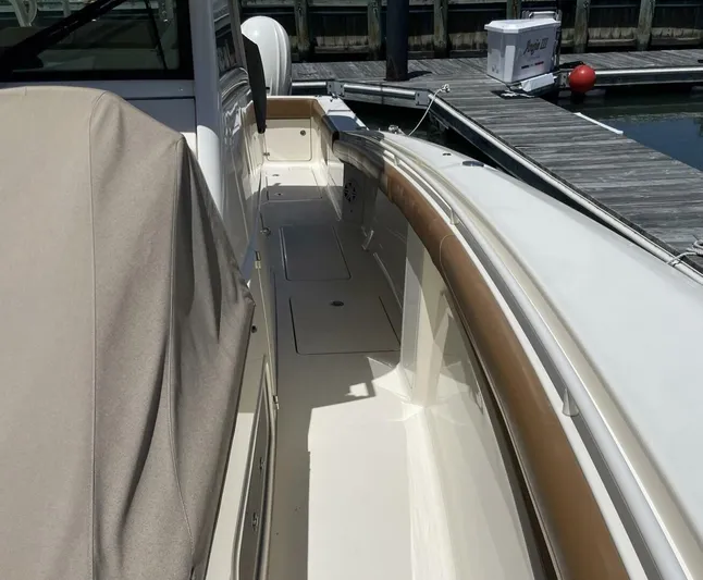 Shady Lady 2 Yacht Photos Pics Scout 380LXF 2019 boat docked with cover and pier.