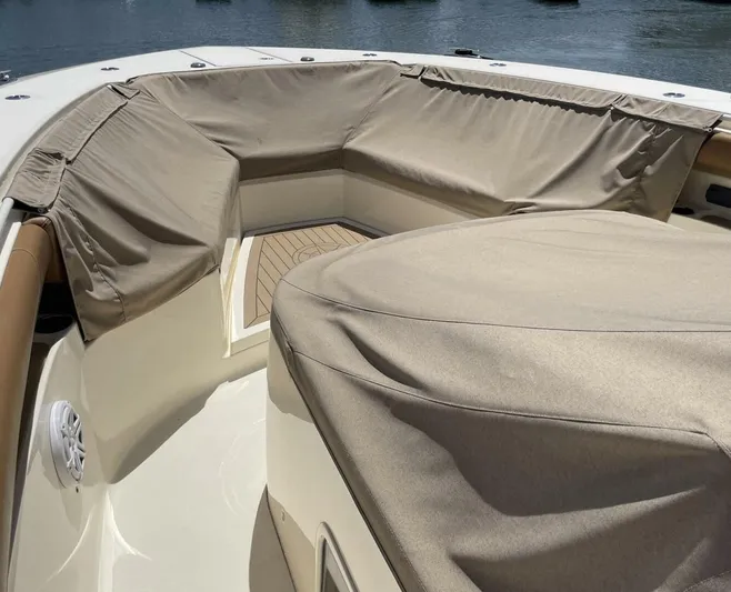 Shady Lady 2 Yacht Photos Pics 2019 Scout 380LXF boat with protective covers on deck area.