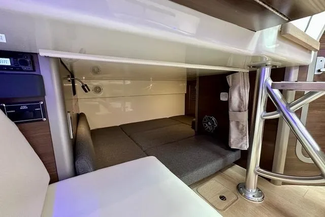  Yacht Photos Pics 2021 Boston Whaler 345 Conquest Pilothouse interior cabin with seating and storage.