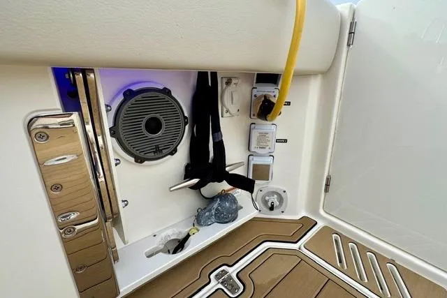  Yacht Photos Pics 2021 Boston Whaler 345 Conquest Pilothouse interior with speaker and utility panel.