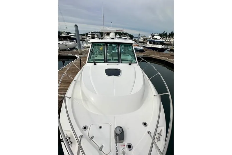  Yacht Photos Pics 2021 Boston Whaler 345 Conquest Pilothouse docked at marina, front view.