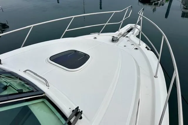  Yacht Photos Pics 2021 Boston Whaler 345 Conquest Pilothouse boat deck with railing and hatch.