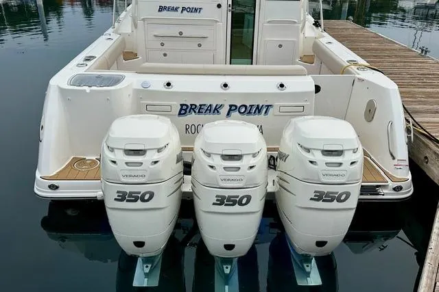  Yacht Photos Pics 2021 Boston Whaler 345 Conquest Pilothouse with triple 350 Verado engines docked.