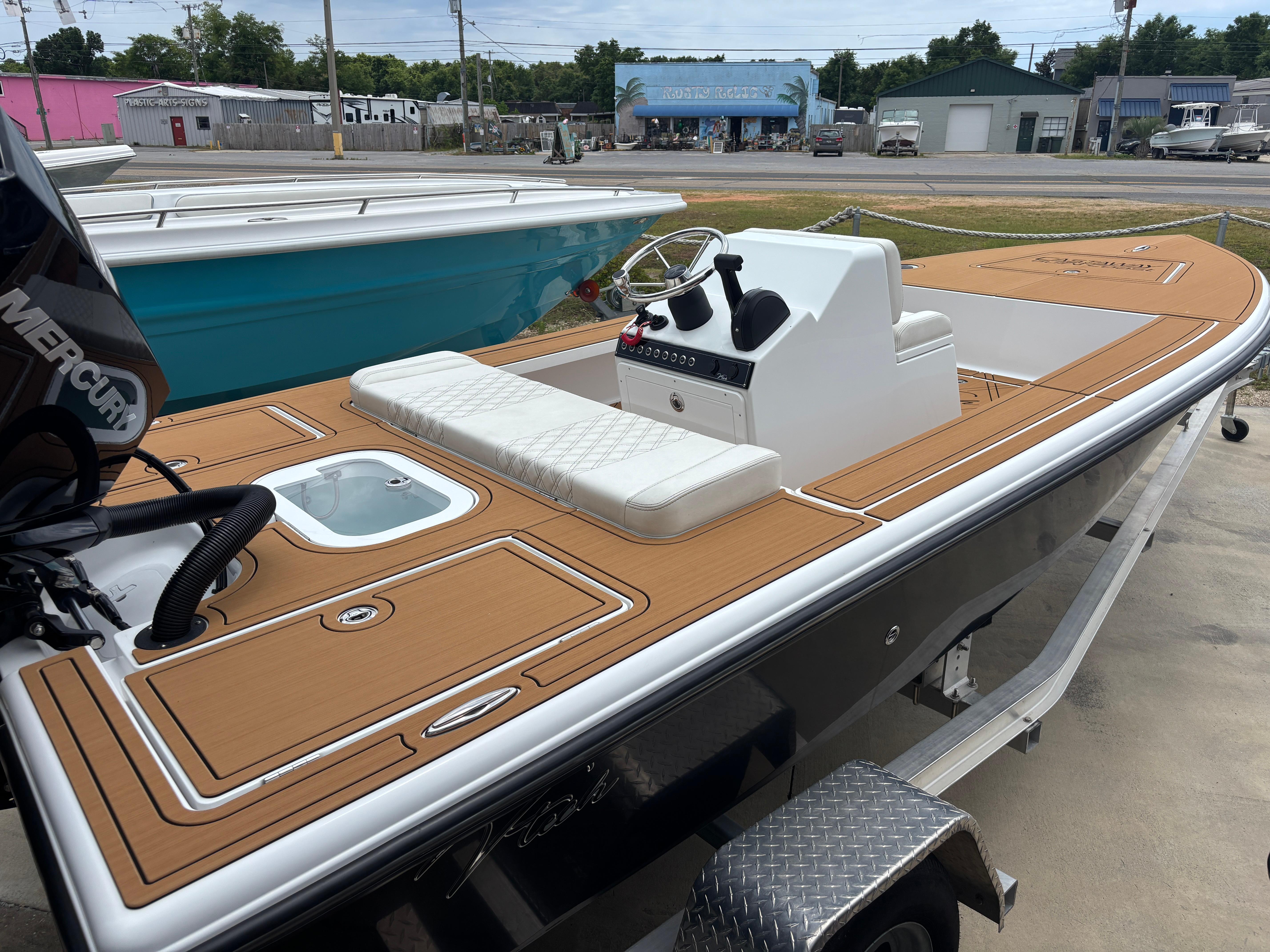 2024 Vtech 18 FLATS boat with tan deck, white seating, and modern console.