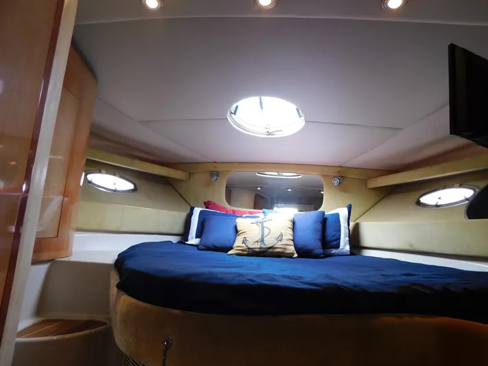 Sea Y'all Yacht Photos Pics Luxurious cabin interior of 2004 Regal Commodore 3860 yacht with cozy bedding.