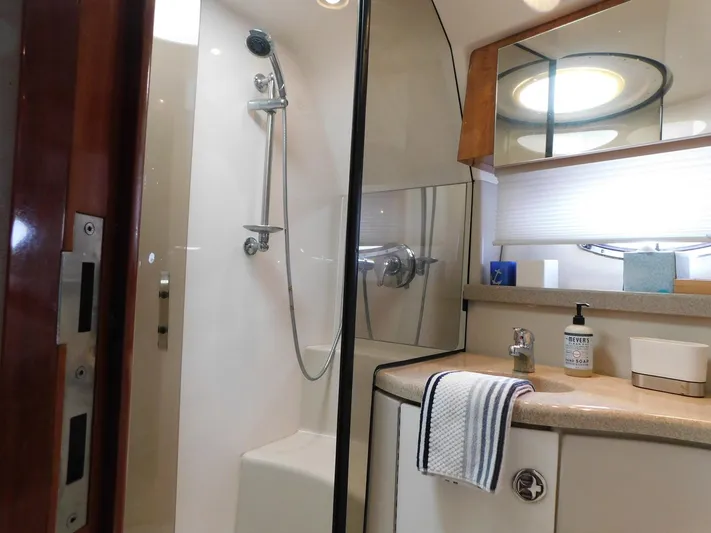 Sea Y'all Yacht Photos Pics Luxurious bathroom in 2004 Regal Commodore 3860 yacht with shower and vanity.