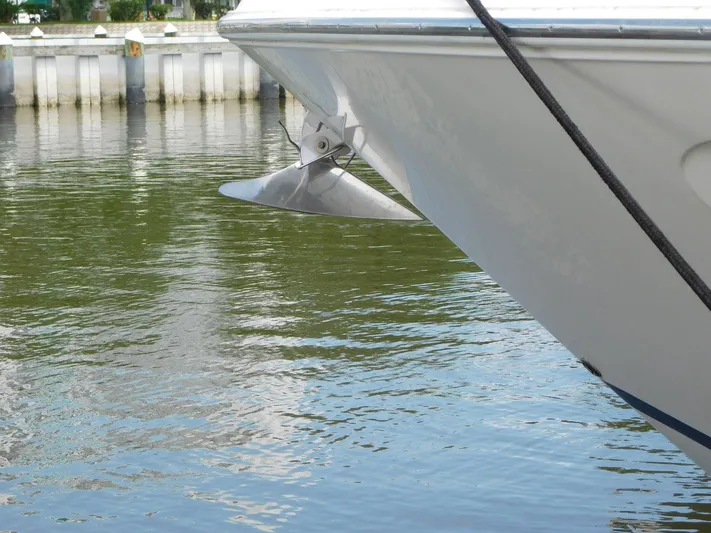Sea Y'all Yacht Photos Pics Bow of 2004 Regal Commodore 3860 yacht with anchor over calm water.