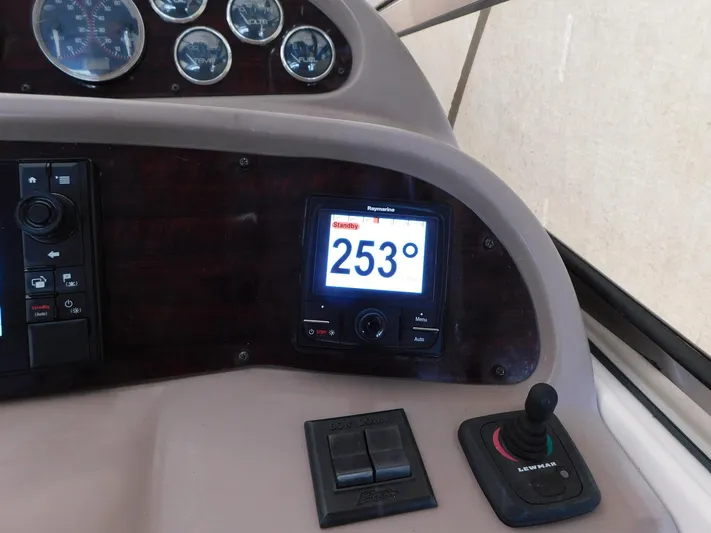 Sea Y'all Yacht Photos Pics Control panel of 2004 Regal Commodore 3860 boat with navigation display showing 253 degrees.