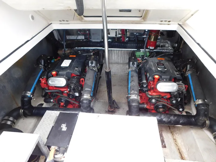 Sea Y'all Yacht Photos Pics Engine compartment of a 2004 Regal Commodore 3860 with dual engines and visible components.