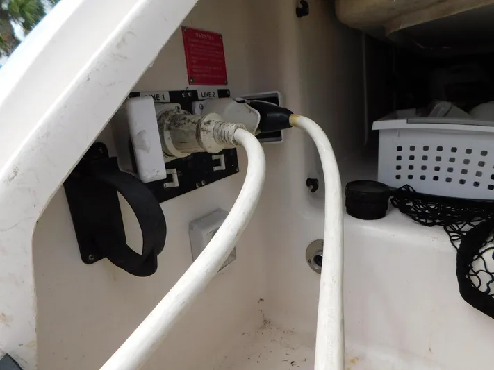 Sea Y'all Yacht Photos Pics Power cables connected in a 2004 Regal Commodore 3860 boat compartment.