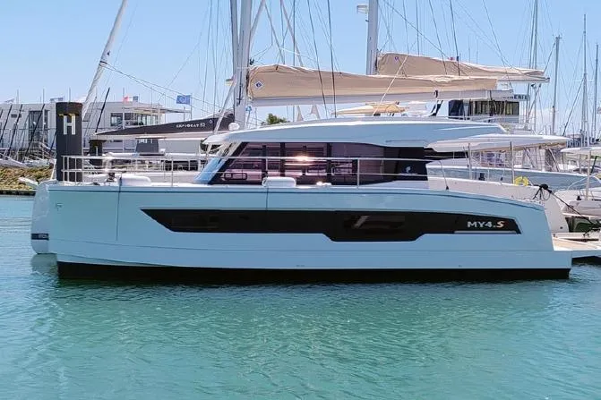  Yacht Photos Pics 2025 Fountaine Pajot MY4.S luxury yacht docked in marina, side view.