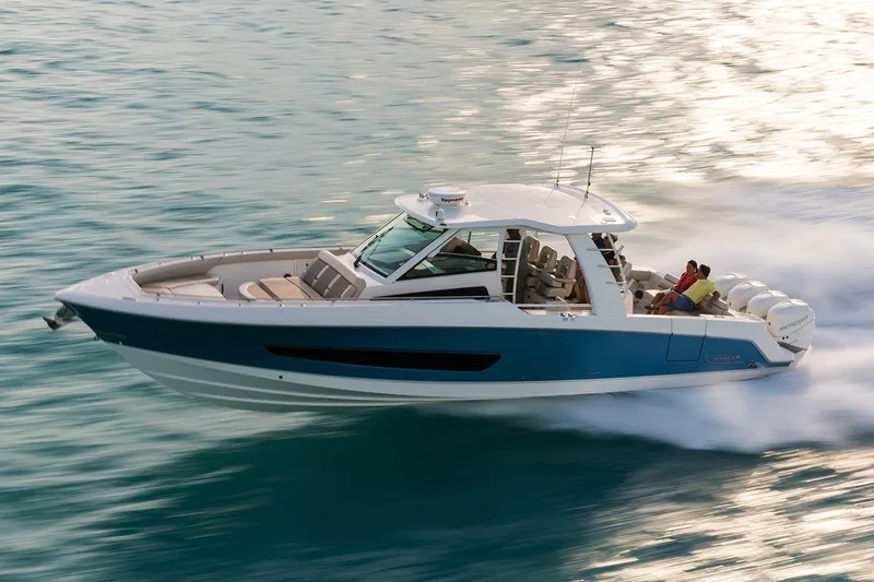 Demo Diamond Yacht Photos Pics 2017 Boston Whaler 420 Outrage cruising on open water, showcasing sleek design and powerful performance.