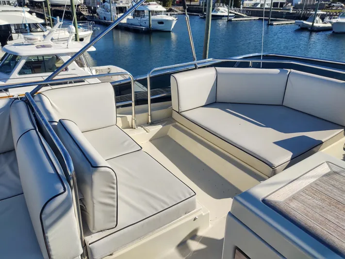 Blue Yacht Photos Pics Blue flybridge sun pad converted to benches