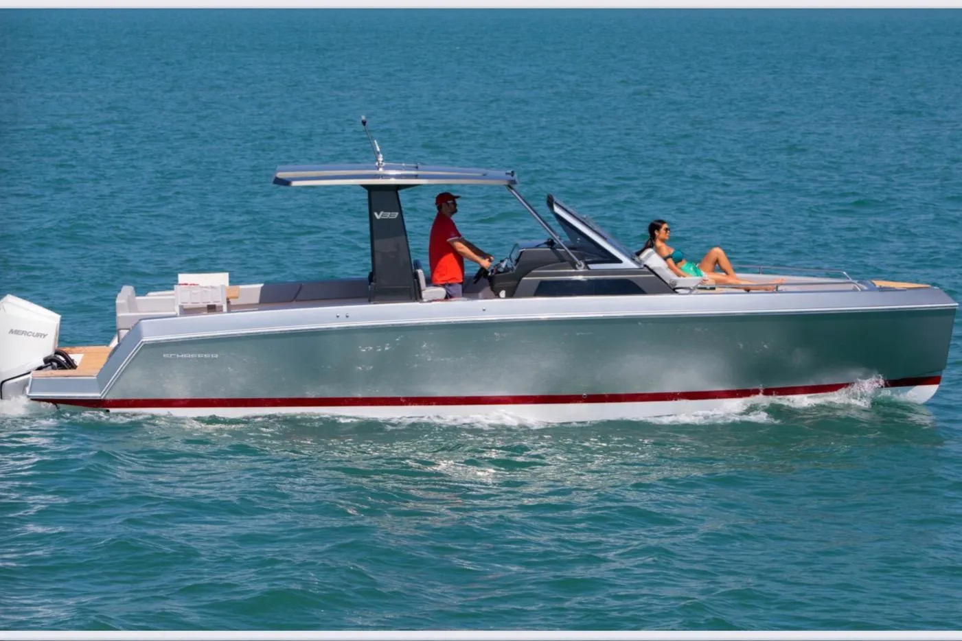 2025 Schaefer V33 boat cruising on blue ocean waters.