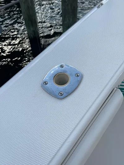 Last Resort Yacht Photos Pics 2013 Bahama Open Fisherman boat detail with rod holder on deck.