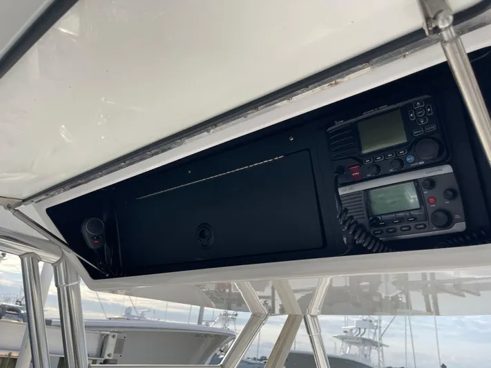 Last Resort Yacht Photos Pics 2013 Bahama Open Fisherman boat console with communication equipment.