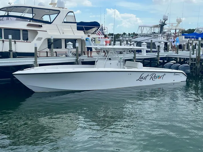 Last Resort Yacht Photos Pics 2013 Bahama Open Fisherman boat named "Last Resort" docked at a marina.