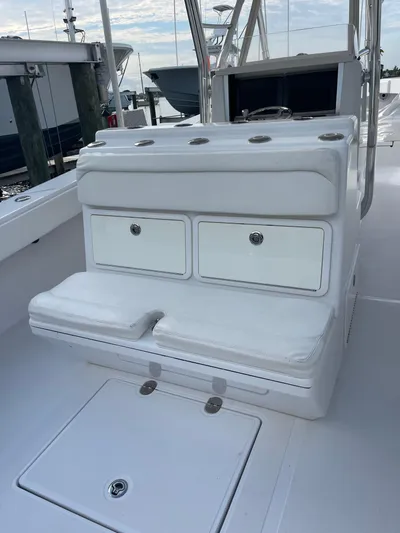 Last Resort Yacht Photos Pics 2013 Bahama Open Fisherman boat interior with white seating and storage compartments.