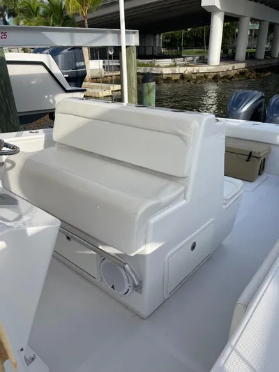 Last Resort Yacht Photos Pics 2013 Bahama Open Fisherman boat interior with white seating and storage compartments.