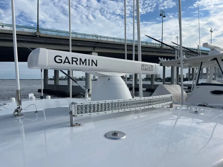 Last Resort Yacht Photos Pics 2013 Bahama Open Fisherman boat with Garmin xHD2 radar under a bridge.