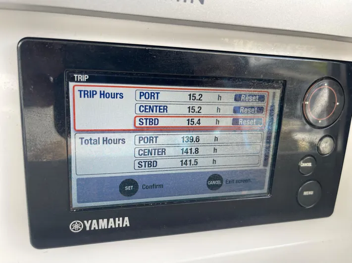 Last Resort Yacht Photos Pics Yamaha display showing trip and total engine hours on a 2013 Bahama Open Fisherman.