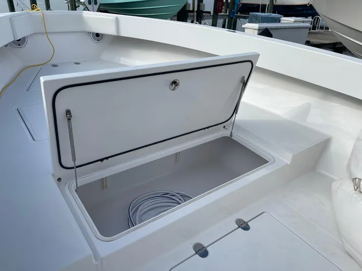 Last Resort Yacht Photos Pics 2013 Bahama Open Fisherman boat with open storage compartment on deck.