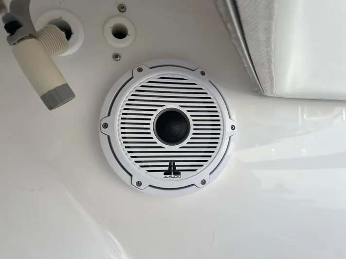 Last Resort Yacht Photos Pics Boat speaker on 2013 Bahama Open Fisherman, JL Audio brand, white panel background.